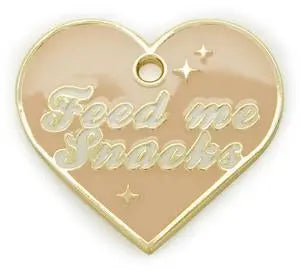 Feed Me Snacks Tag.