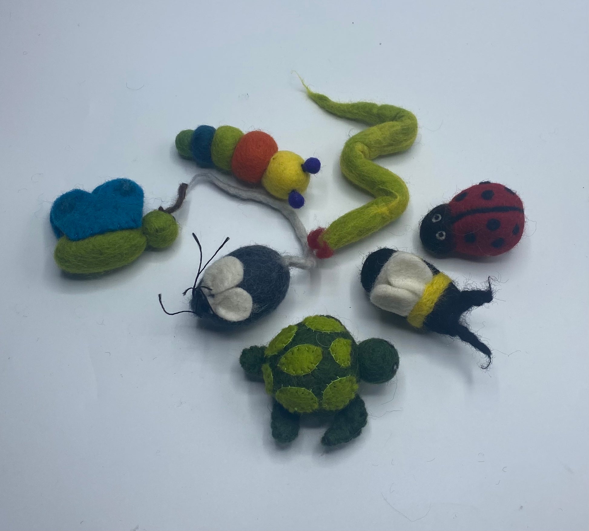 Felted backyard Cat toy.